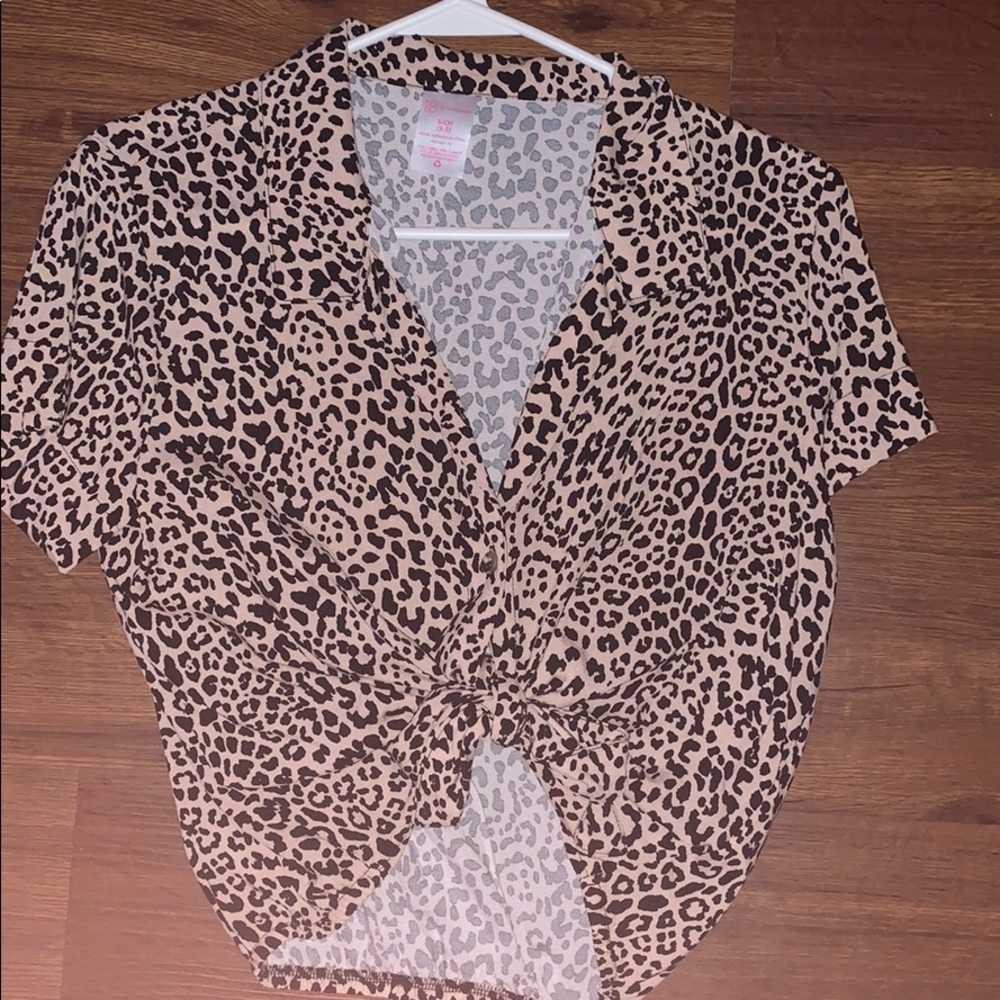 Cheetah button up and collared top.